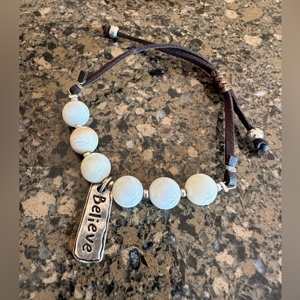 White Beaded Bracelet with 'Believe' Charm
